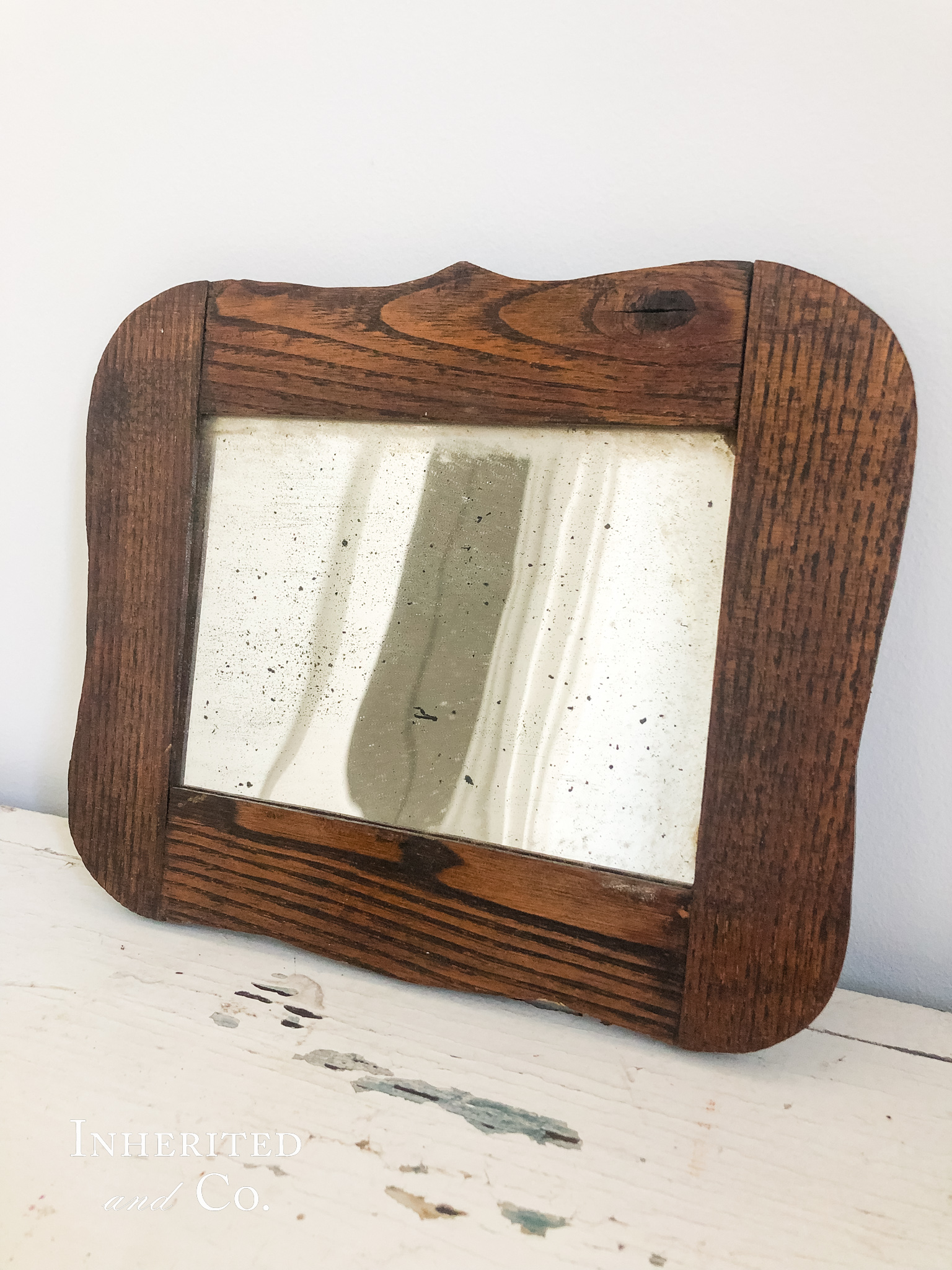 Antique Oak Mirror on chippy white surface