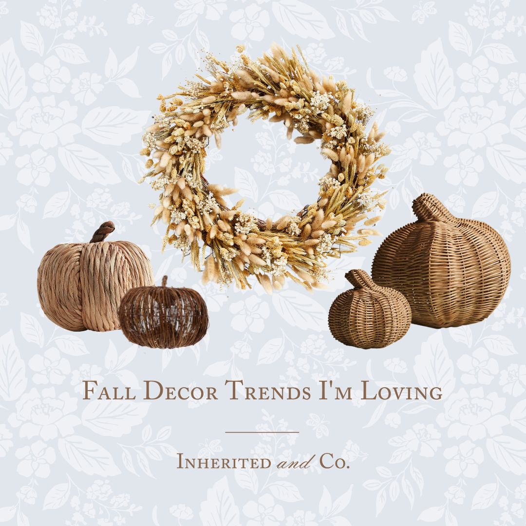 Graphic image with pale blue floral background with a dried wheat wreath centered and flanked by two woven pumpkins on each side