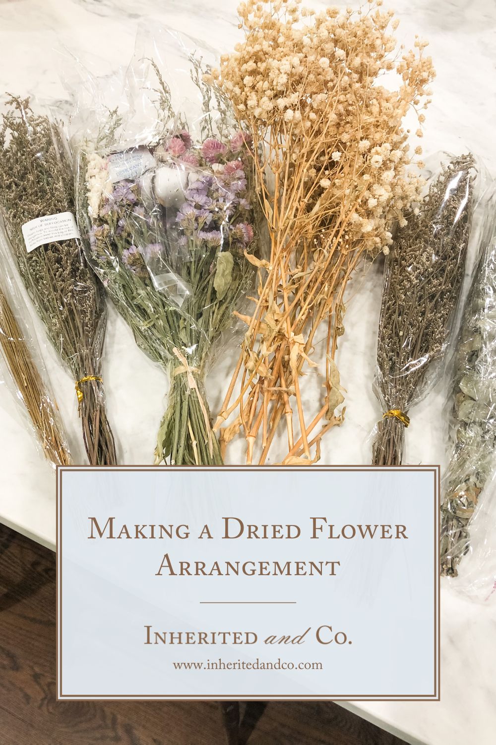 graphic with dried flower bundles on a marble countertop with a pale blue box that reads "Making a Dried Flower Arrangement Inherited and Co."