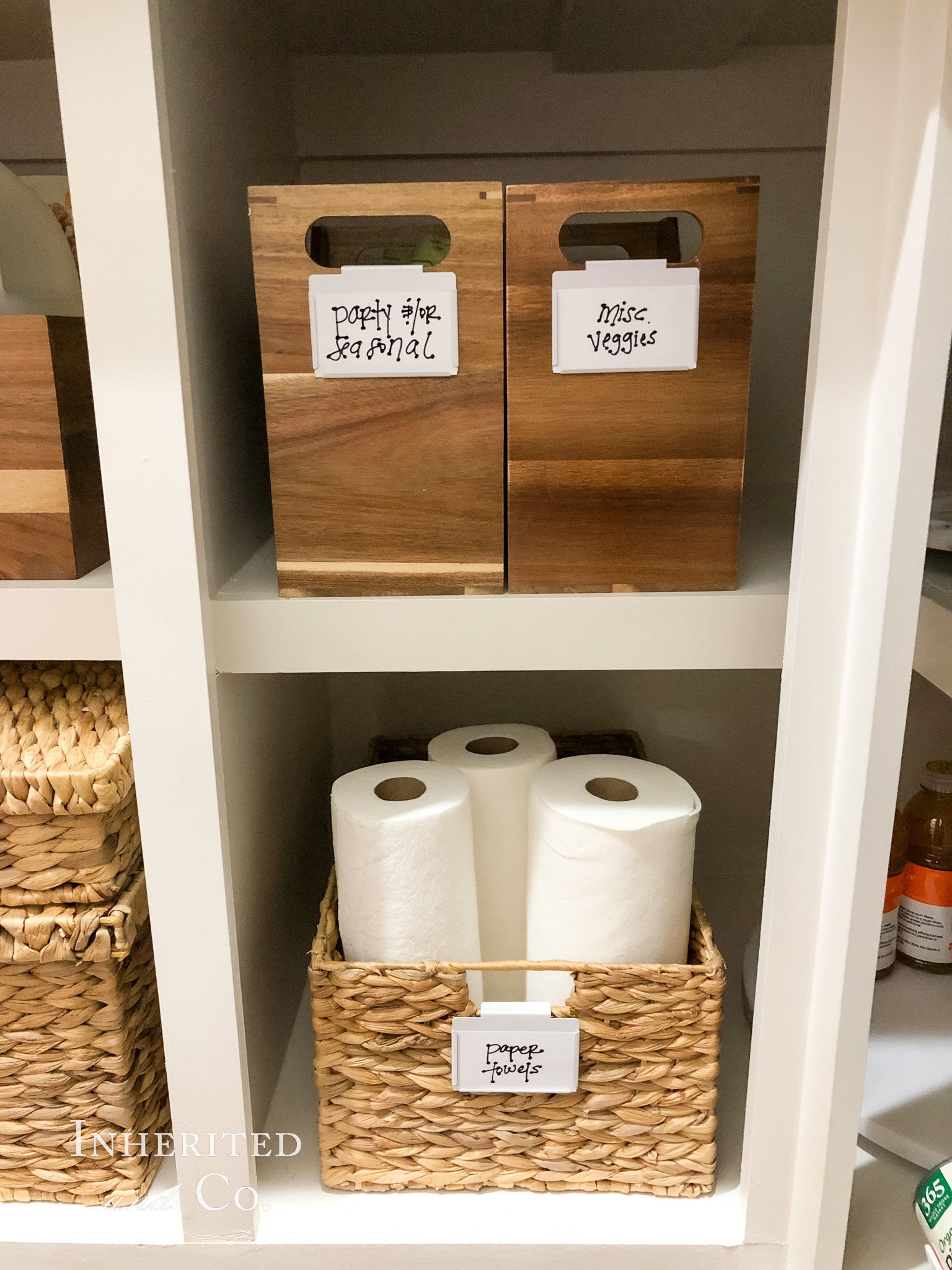 acacia file bins and paper towels in a hyacinth basket