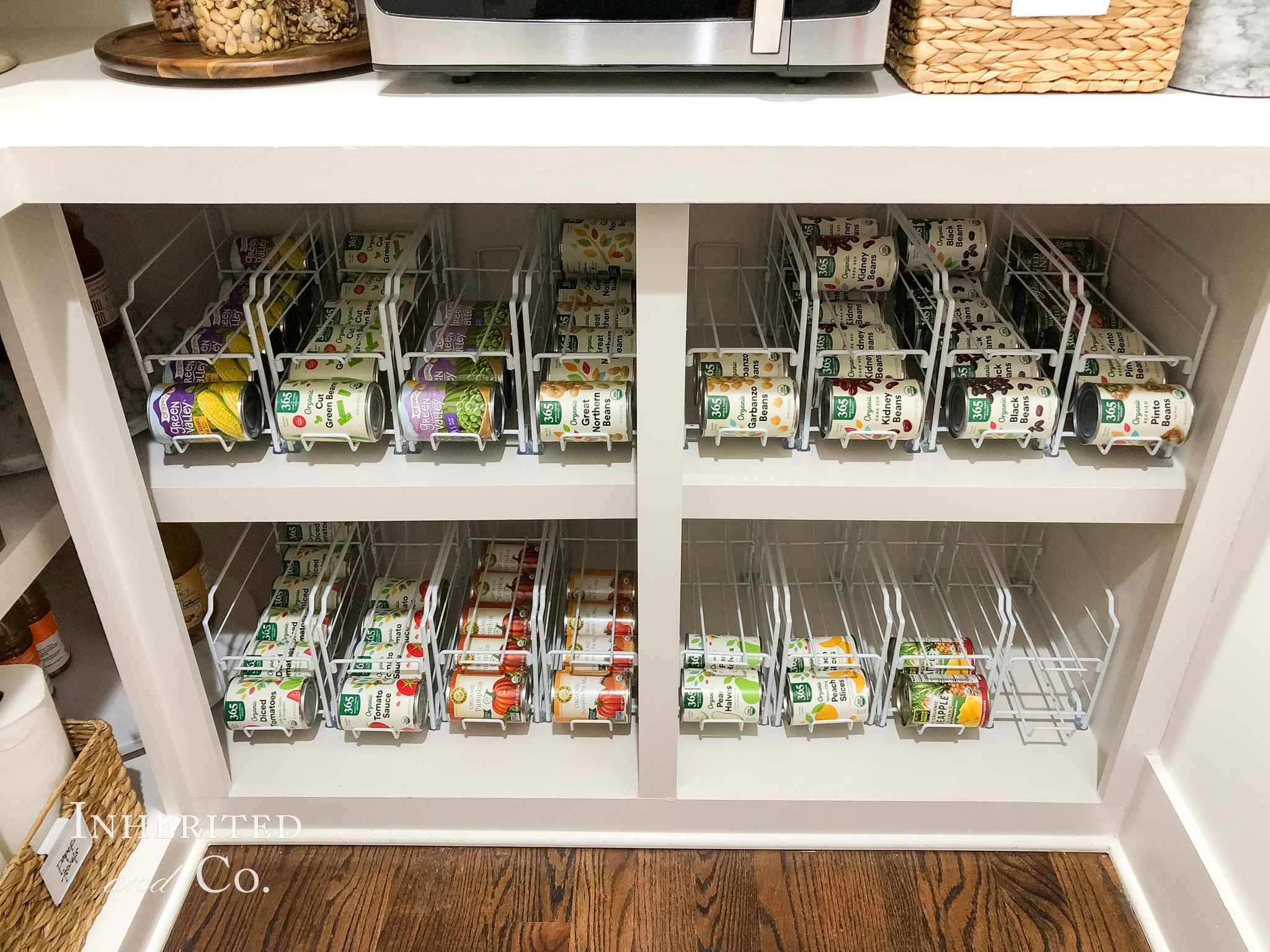rows of canned goods in metal organizers