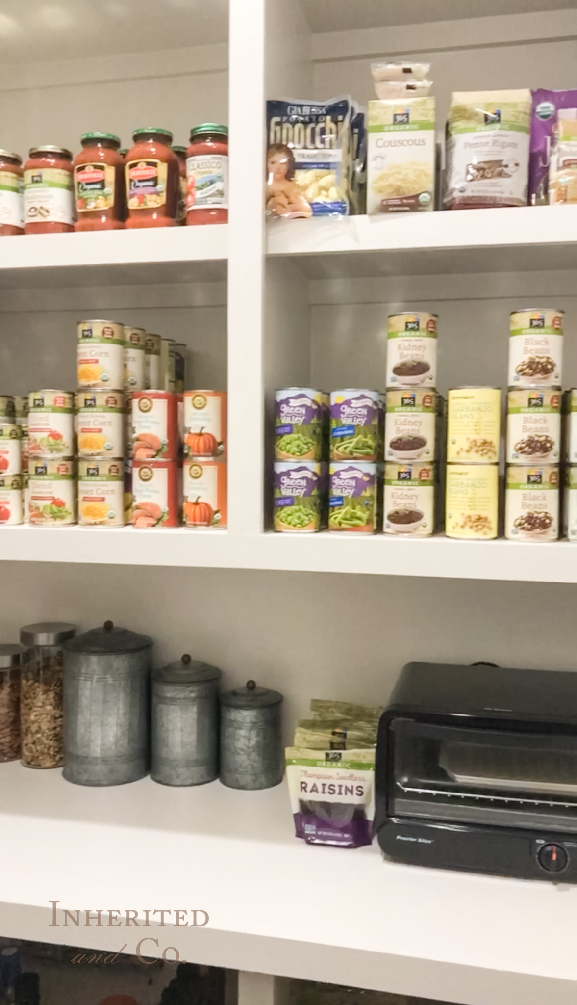 blurry photo of stocked pantry shelves