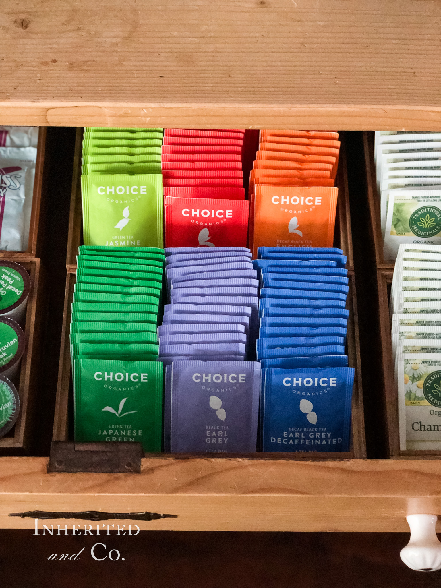 Choice Organics teas organized in a drawer of an antique cabinet