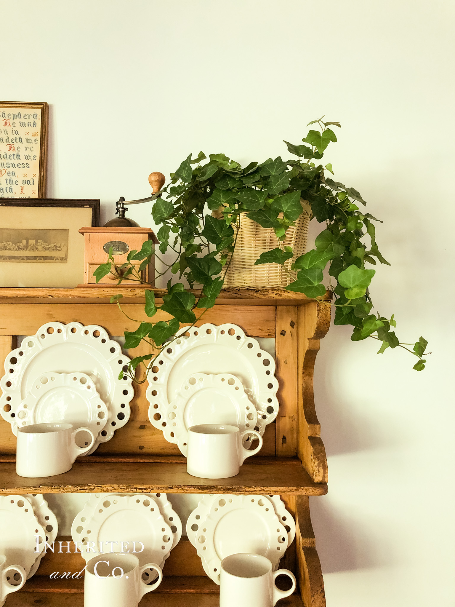 English ivy plant atop an antique hanging shelf