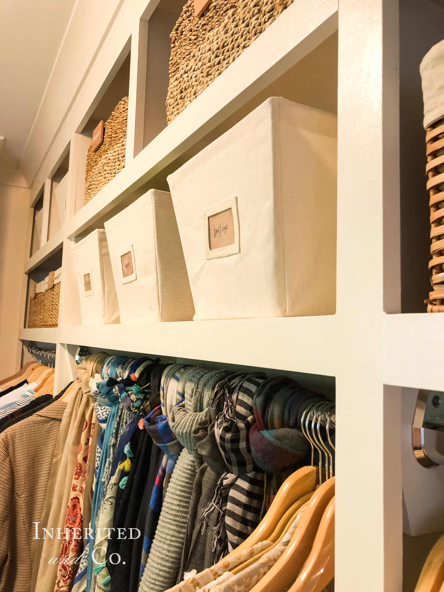 Canvas and woven bins in an organized closet