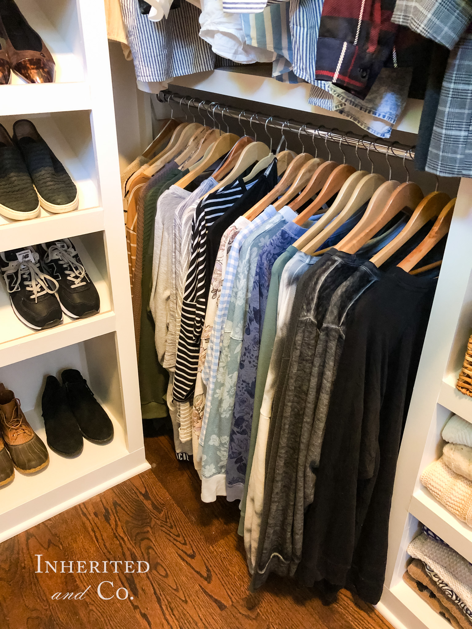 Long sleeve t-shirts and sweatshirts in an organized closet