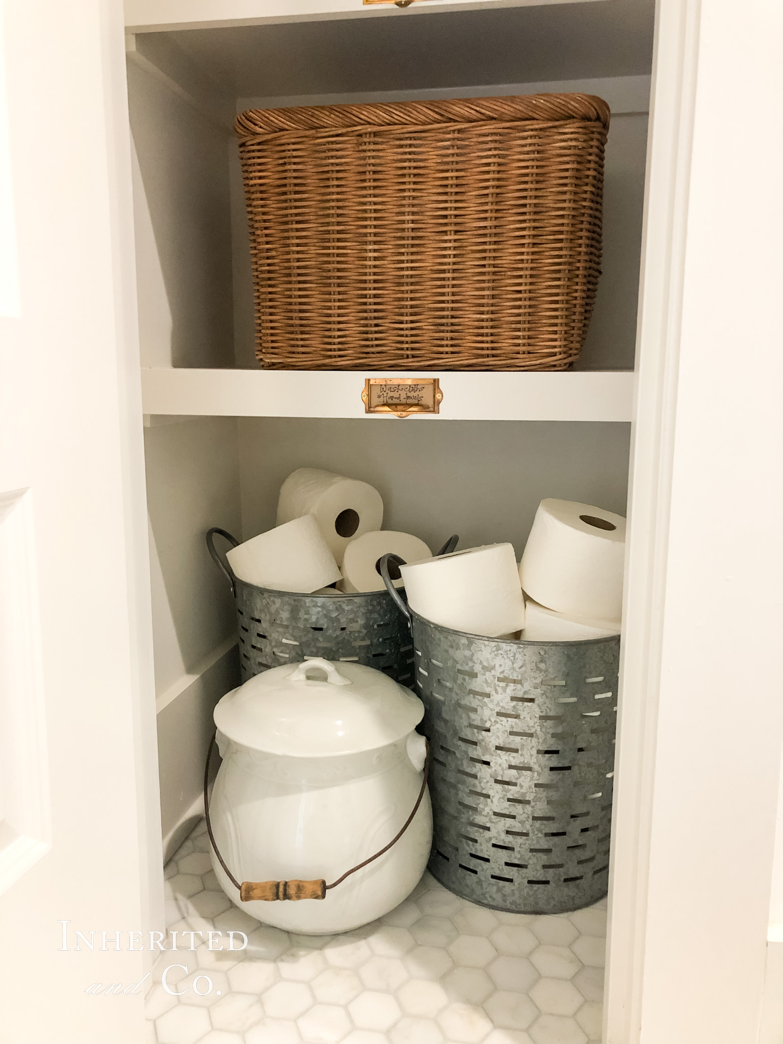 Towel Closet Organization with Antique Ironstone and Rattan Baskets