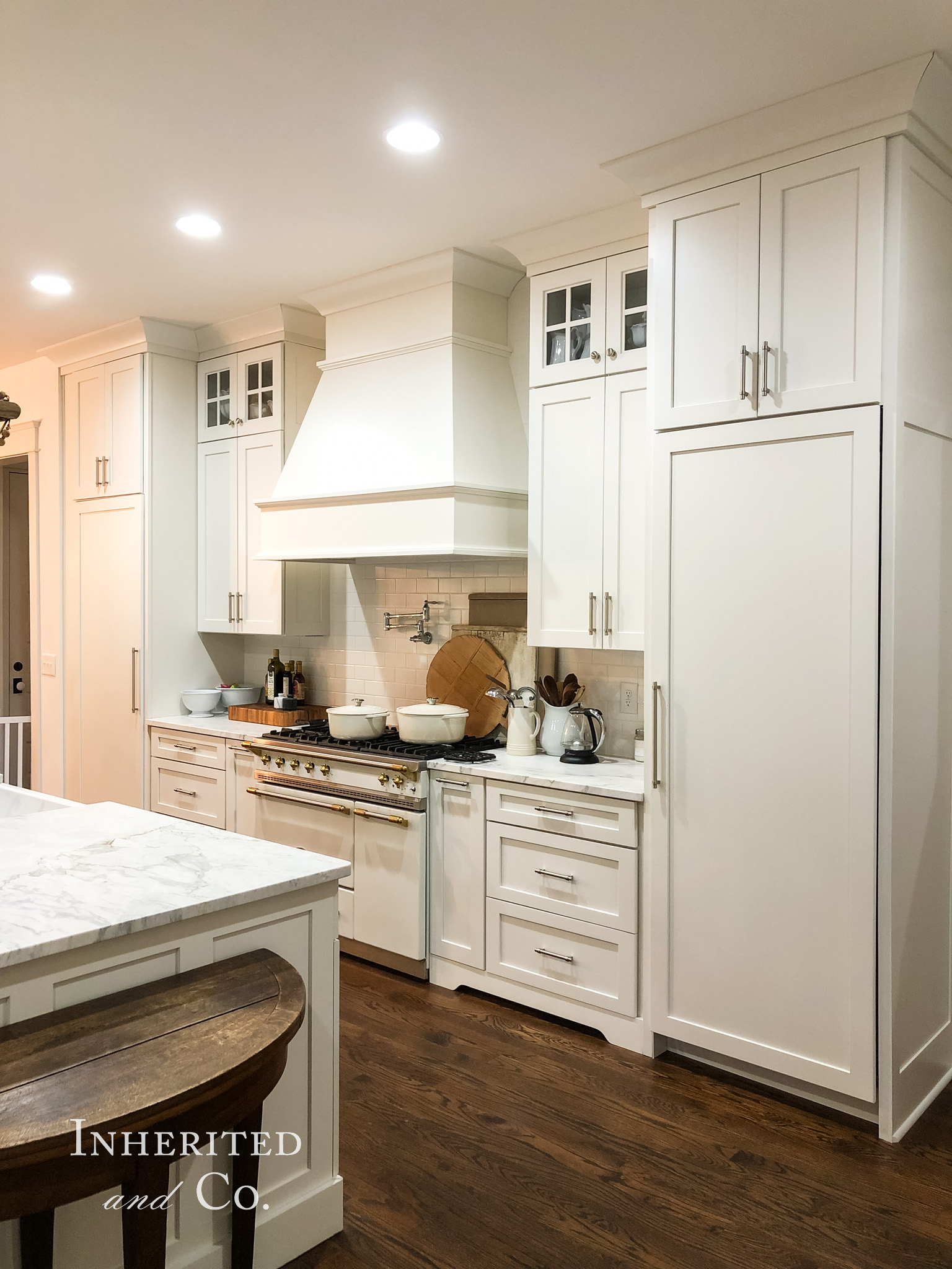 Paneled fridge and freezer in a custom kitchen