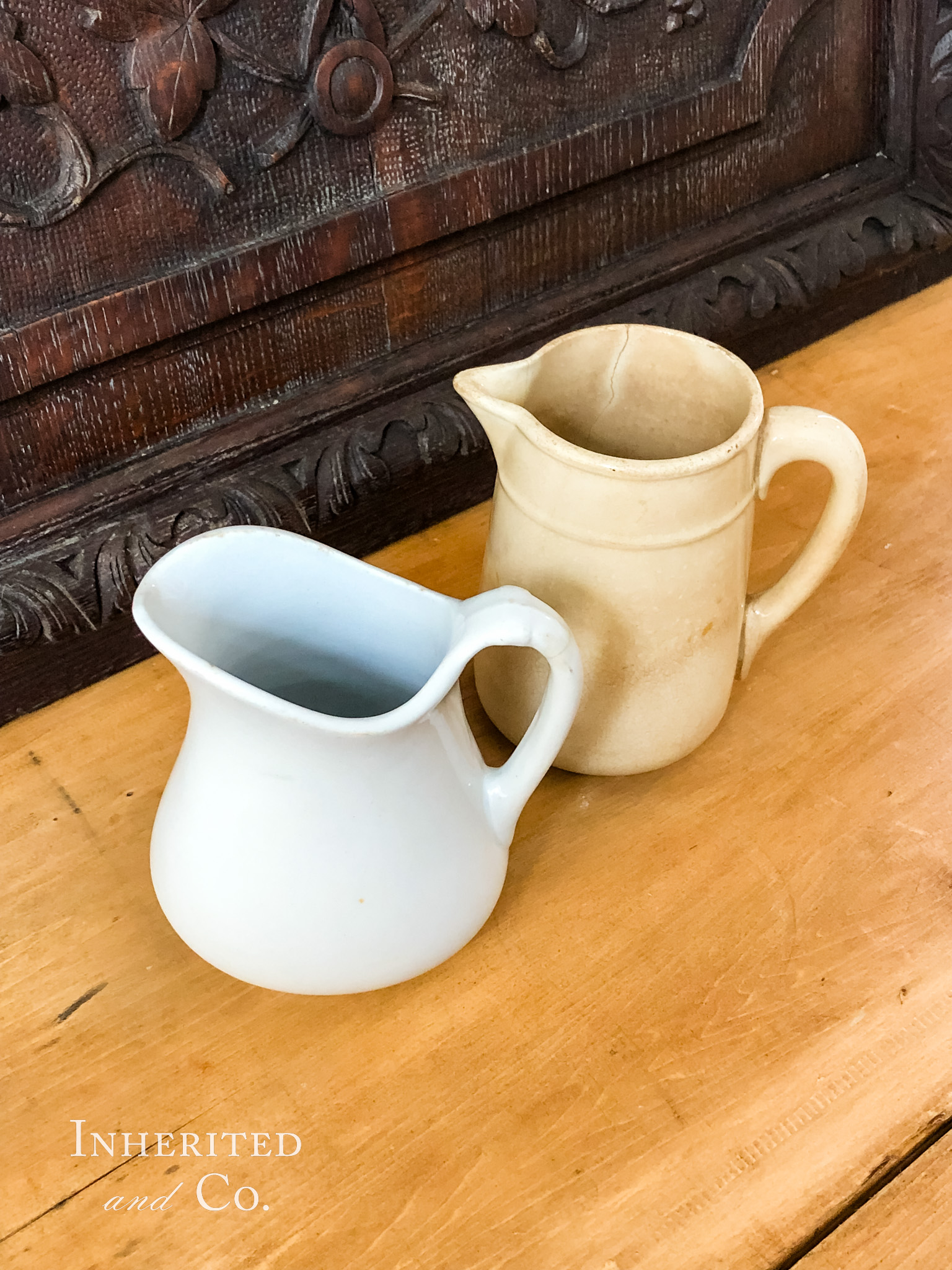 white ironstone pitcher and stained ironstone pitcher