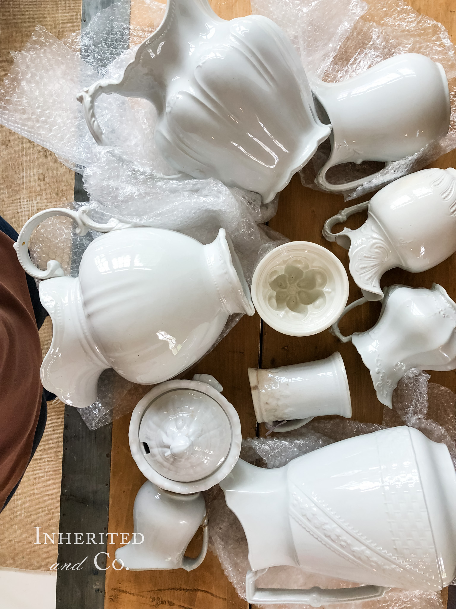 White ironstone pitchers, ironstone mold, ironstone sauce tureen