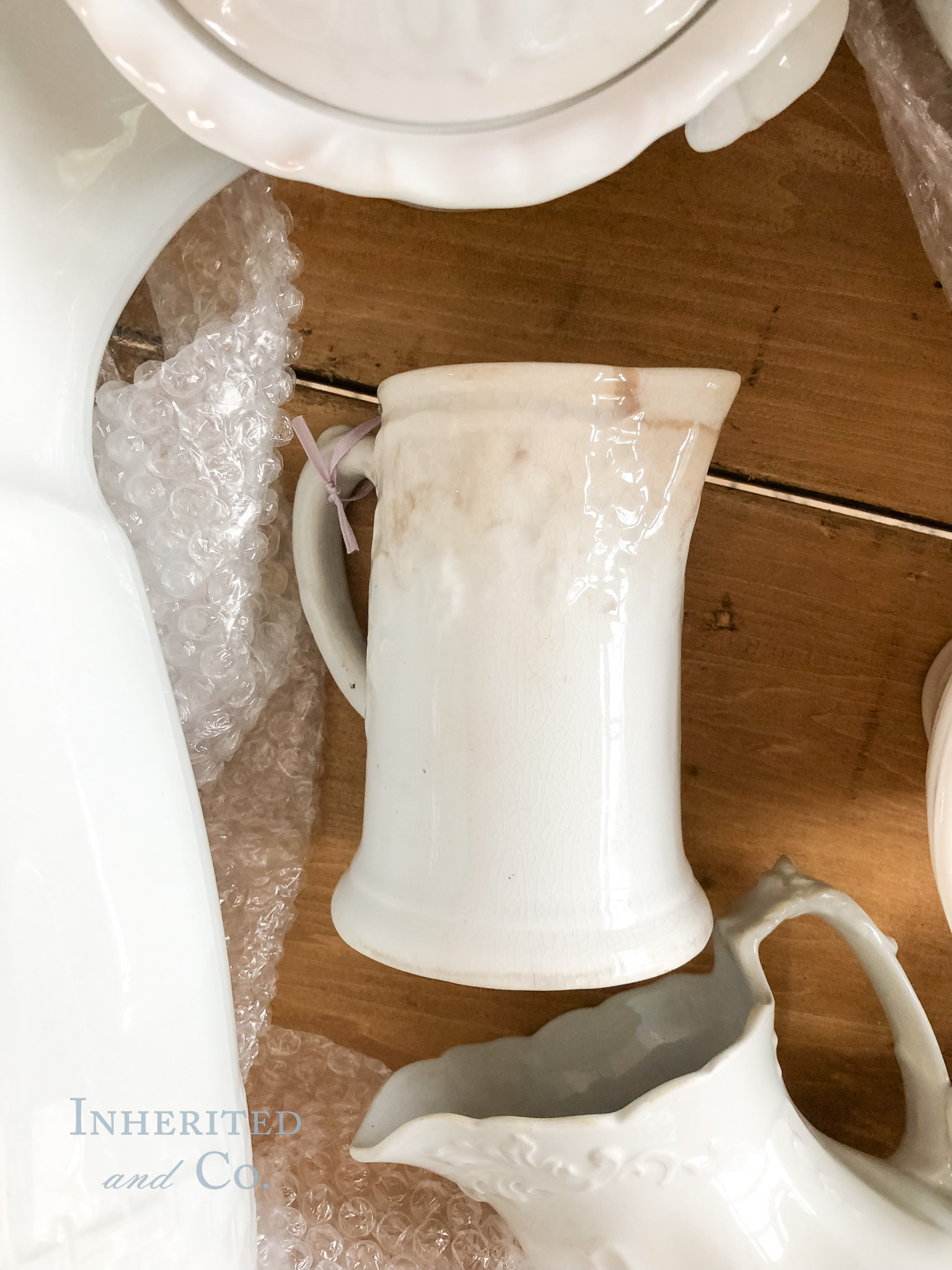 Stained ironstone syrup pitcher