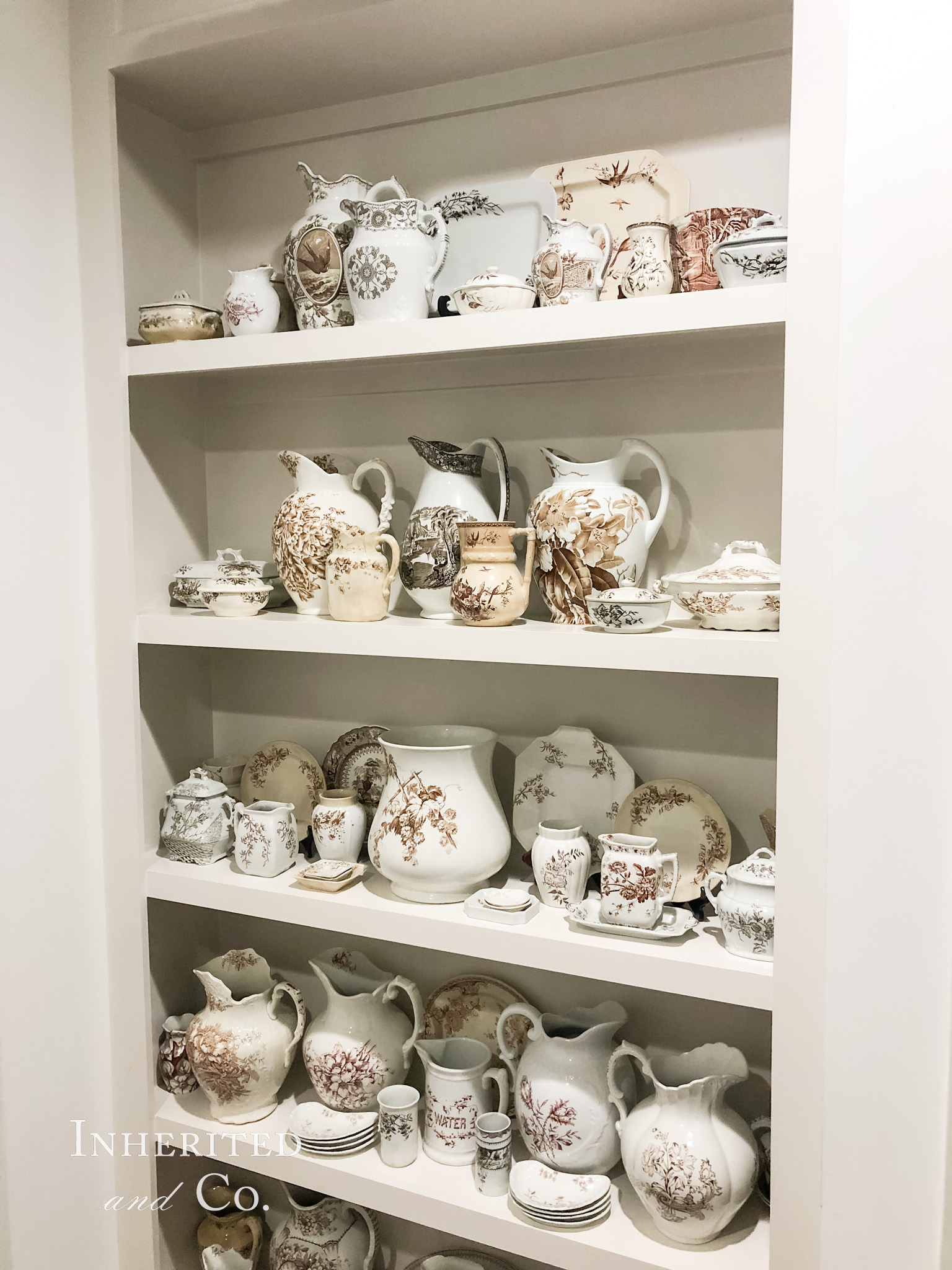 Bookshelf filled with antique brown transferware