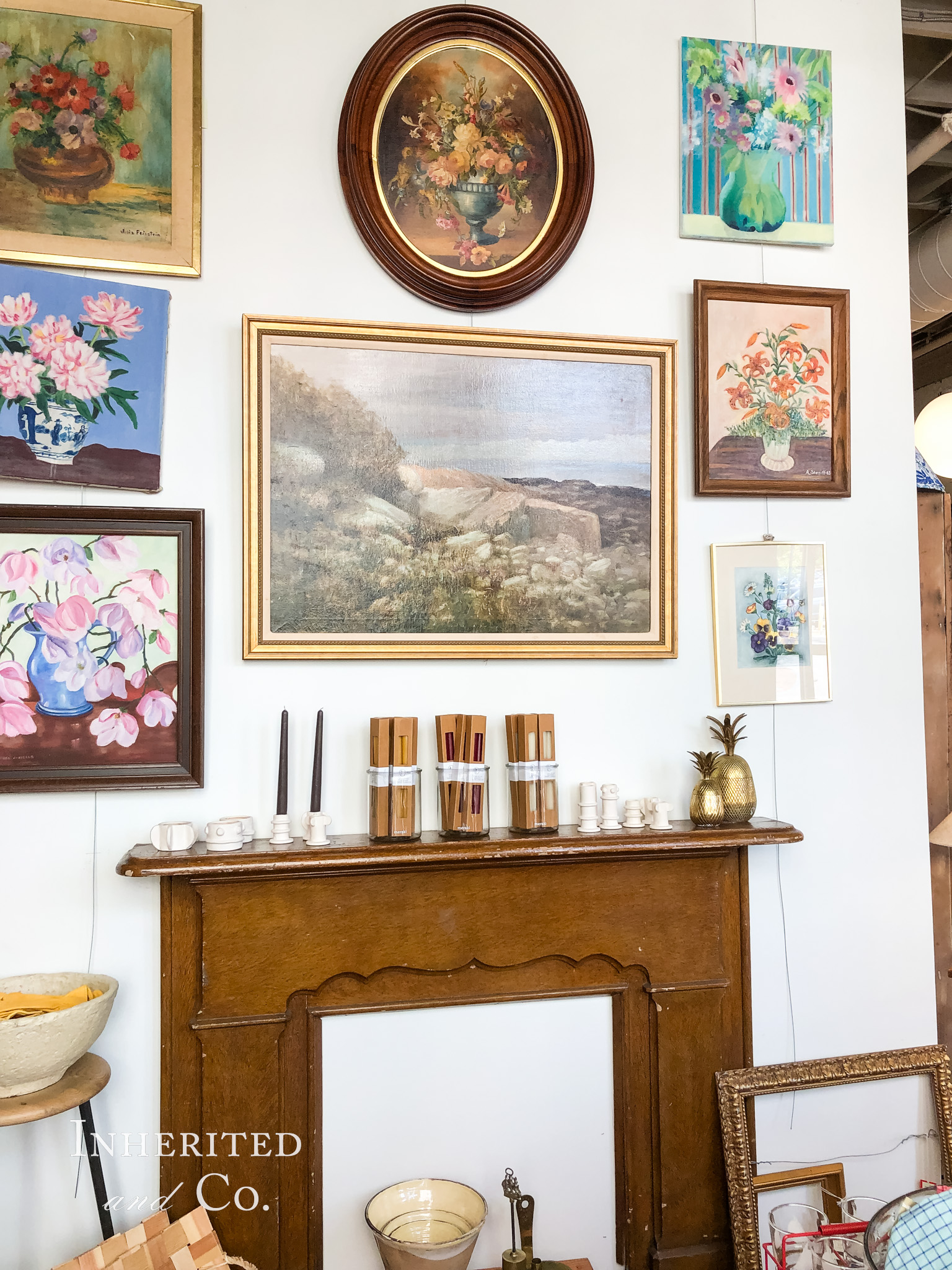 Antique Mantel and Floral Artwork at Viand Mercantile